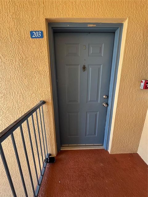 Photo of 495 Las Cortes Lane #203, Orlando, FL 32824 (MLS # S5148185)