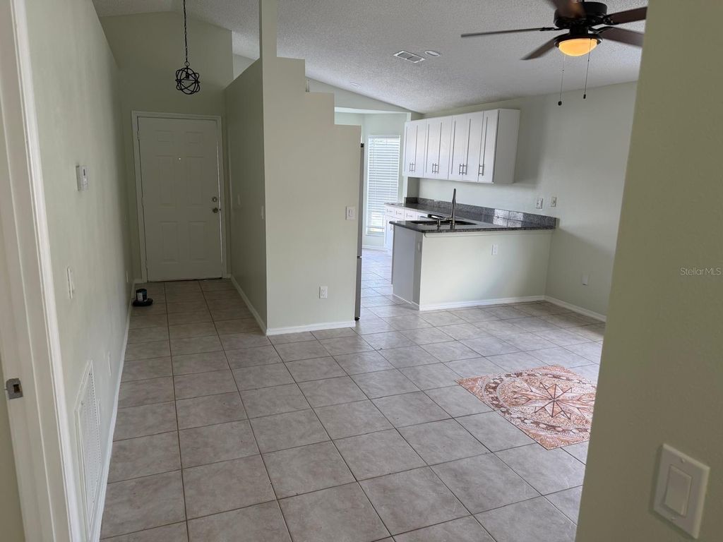 Photo of 13875 Glasser Avenue, Orlando, FL 32826 (MLS # O6389190)
