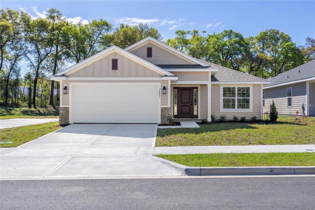 Photo of 213 SW Bellflower Drive, Lake City, FL 32024 (MLS # GC543845)
