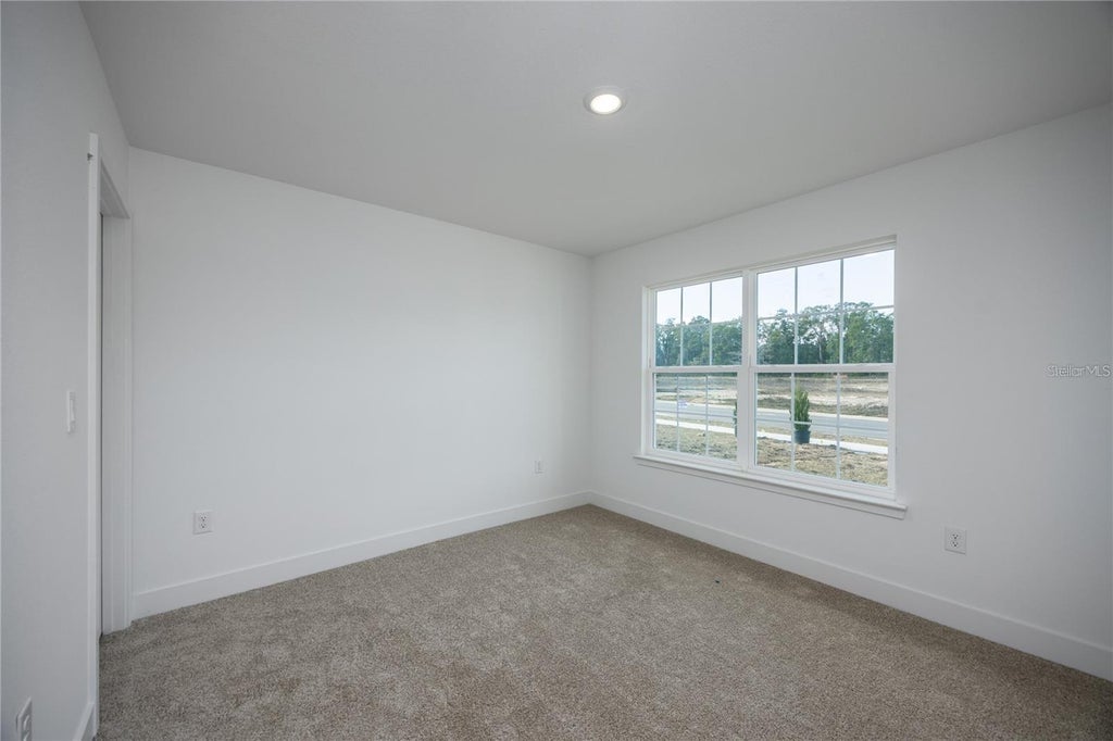 Photo of 213 SW Bellflower Drive, Lake City, FL 32024 (MLS # GC543845)