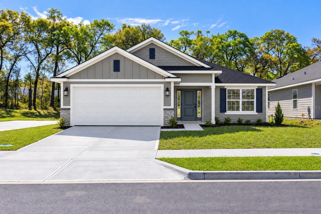 Photo of 213 SW Bellflower Drive, Lake City, FL 32024 (MLS # GC543845)