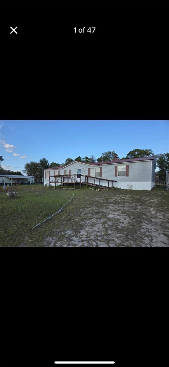 Fantastic opportunity for a first time homebuyer or anyone looking to downsize in a quiet beautiful part of Florida!! This 3 bedroom, 2 bathroom mobile home offers incredible potential for anyone looking to customize a home that doesn't need any of the majors being able to move in with peace of mind knowing that the Roof and HVAC were both recently replaced you can just get creative in the property decorating and customizing to your liking!! This property will not last long, schedule a showing today!! Sold as-is