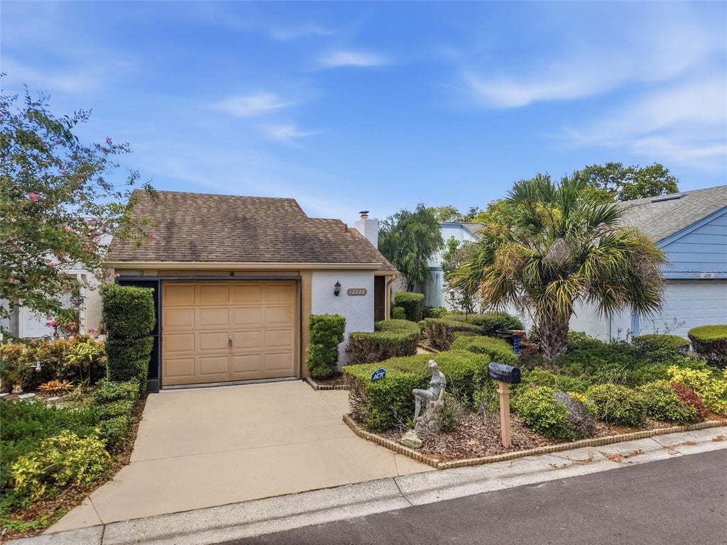 Photo of 12229 Cider Mill Lane, Hudson, FL 34667 (MLS # TB8540247)