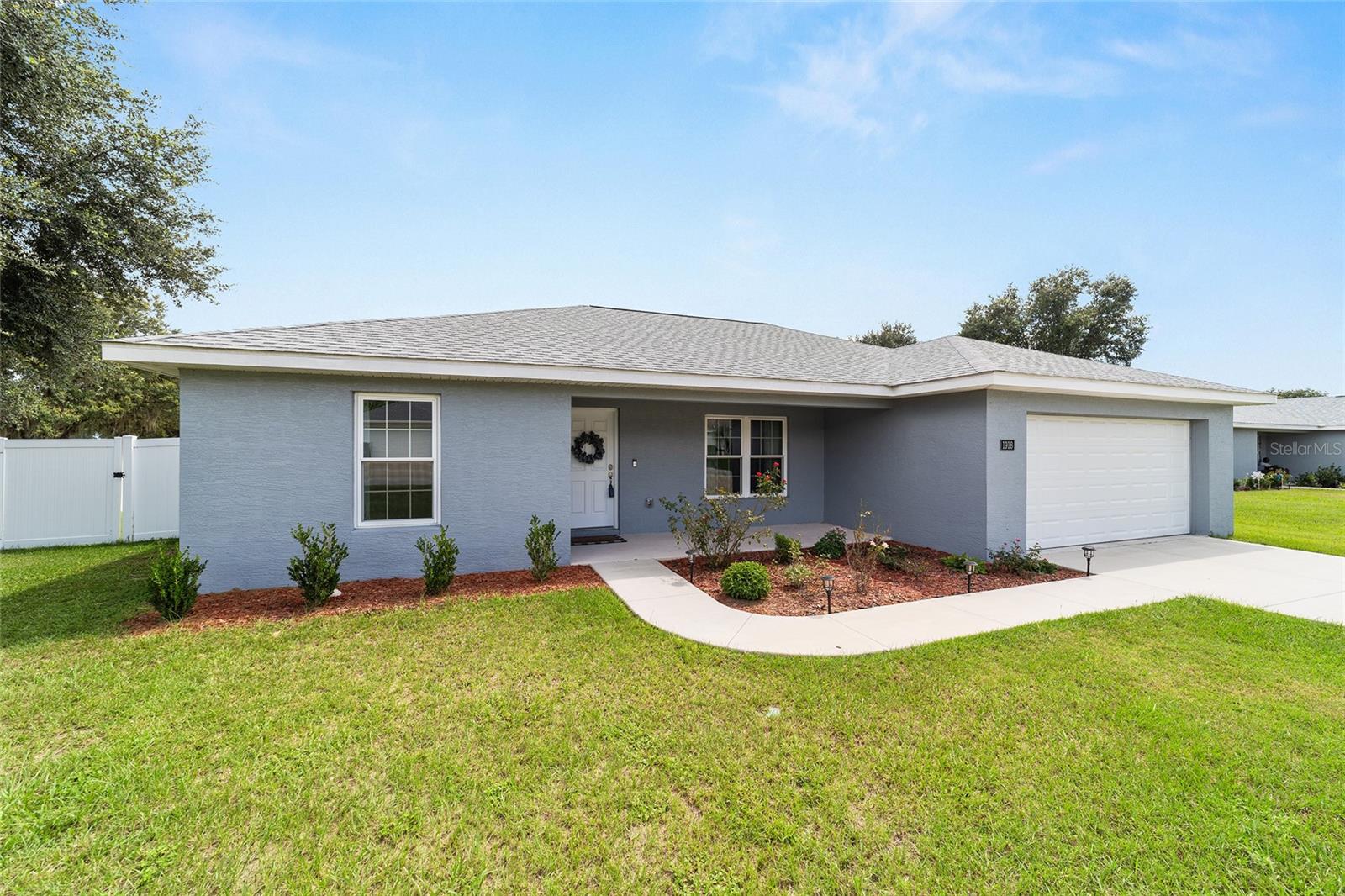 Like-New 3 BR/2BA in Citra Highlands - Country Living,Convenient Location 1/2 way between Ocala and Gainesville. Welcome to this immaculate home featuring a 2 car garage and brand new vinyl privacy fencing. Step inside to an open floor plan with a spacious kitchen boasting Whirlpool stainless steel range and microwave, granite countertops, soft-close drawers and classic shaker cabinets, plus a convenient breakfast bar for casual dining. The primary suite offers a large walk-in closet and a private ensuite bathroom, while the additional bedrooms provide comfort for family or guests. Enjoy the convenience of an inside laundry and the peace of mind of a move-in ready home. This location offers an easy commute to Shands, University of Florida, Downtown Ocala, Advent Health in Ocala and that peaceful quiet living away from the hustle and bustle of the city!