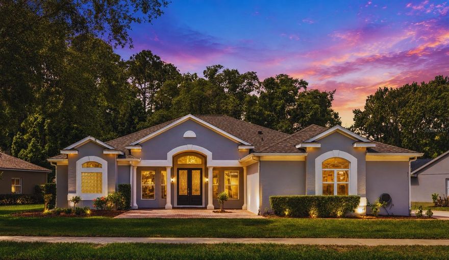 One or more photo(s) has been virtually staged. MOVE-IN READY GOLF COMMUNITY HOME WITH CONSERVATION VIEWS IN THE HEART OF LAKE MARY - Experience the perfect blend of privacy, nature, and convenience in this beautifully updated one-story home located in the highly desirable Timacuan Golf & Country Club community. Backing to the Crystal Lake Conservation Area with no rear neighbors, this home offers a peaceful setting rarely found in Central Florida. Enjoy year-round outdoor living from the expansive 60-foot screened lanai, surrounded by mature landscaping, shade trees, and serene natural views—all with no backyard mowing required. Inside, nearly 2,600 square feet of thoughtfully designed living space features 3 spacious bedrooms, 3 full bathrooms, a dedicated private office, and a convenient guest half bath. The split floor plan provides privacy while the open-concept layout seamlessly connects the kitchen, family room, dining area, and outdoor living spaces. The updated kitchen serves as the heart of the home, showcasing quartz countertops, modern gray cabinetry, a large pantry, and stainless steel appliances. Fresh interior paint, elegant marble flooring, built-in surround sound, and a cozy wood-burning fireplace create a home that is both stylish and comfortable. Major updates provide peace of mind, including a new roof (2018), HVAC system (2017), renovated bathrooms, and an updated kitchen. Additional highlights include: Oversized 1/3-acre lot, Fruit trees and mature landscaping, EV-ready 220-volt garage outlet, Spacious two-car garage, and extended driveway with parking for up to four additional vehicles. Located just minutes from top-rated schools, Publix, AdventHealth, Orlando Health, Colonial Town Park, Downtown Lake Mary, Interstate 4, and SR-417, this home combines natural beauty with exceptional convenience. Priced below recent appraisal value, this is a rare opportunity to own a meticulously maintained home in one of Lake Mary's most sought-after communities. Schedule your private showing today.