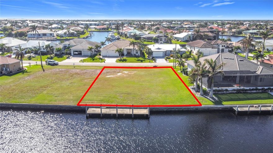 BACK TO MARKET WITH A REDUCED PRICE!! Great opportunity to build your dream home!! Sailboat unrestricted gulf access lot via Charlotte Harbor. The property has been significantly improved with the construction of a very high quality boat dock measuring 10'X 45' installed in 2021. (See attachments for the specifications) Superior water view at the mouth of a wide basin and can navigate a large boat accordingly. The property is a short drive to all the wonderful things Punta Gorda has, including Fishermans Village, parks, shopping and many restaurants. Minutes to US 41 and I-75 for easy access to all the many great things that Southwest Florida offers. Make your offer now and jump in on this great opportunity!!!