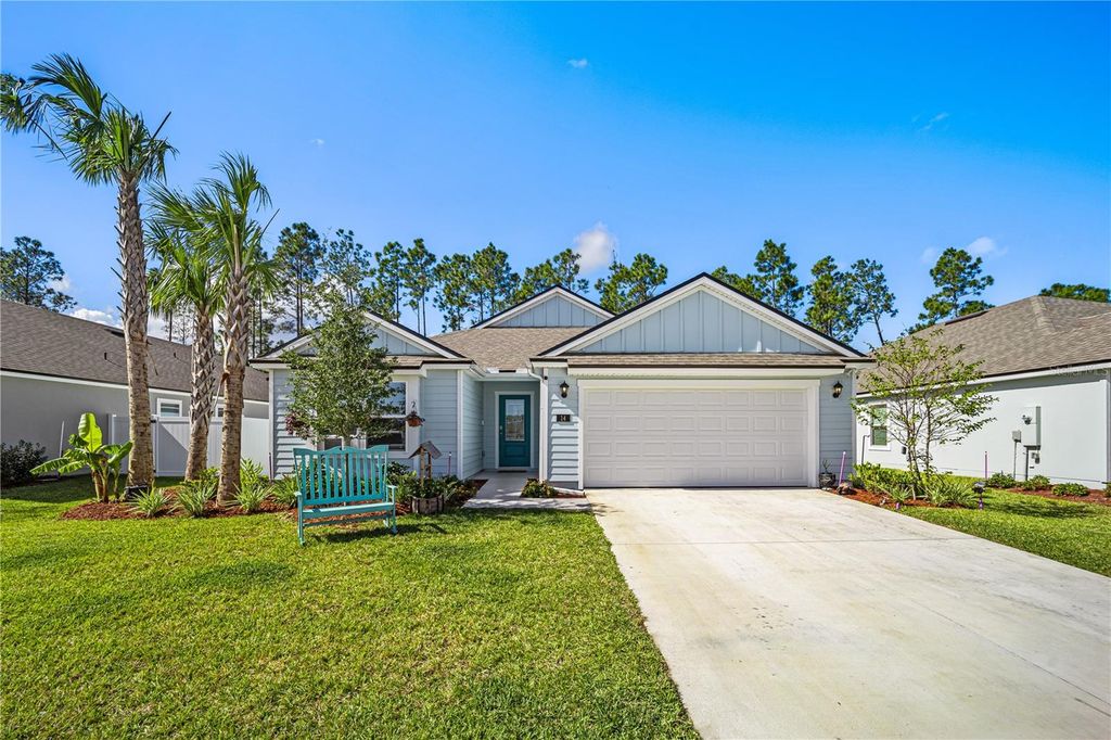 Photo of 14 Lumber Jack Trail, Palm Coast, FL 32137 (MLS # FC318739)