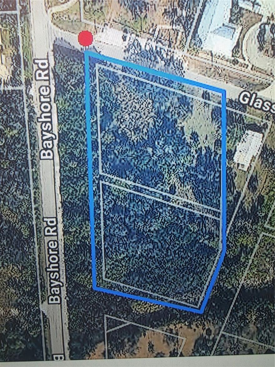 2 parcels totaling over 1.75 acres with commercial zoning. Charlotte Harbor Mixed Use  with 370 feet of Frontage on Bayshore and 226 feet on Glass lane. This is a prime piece of property for development.