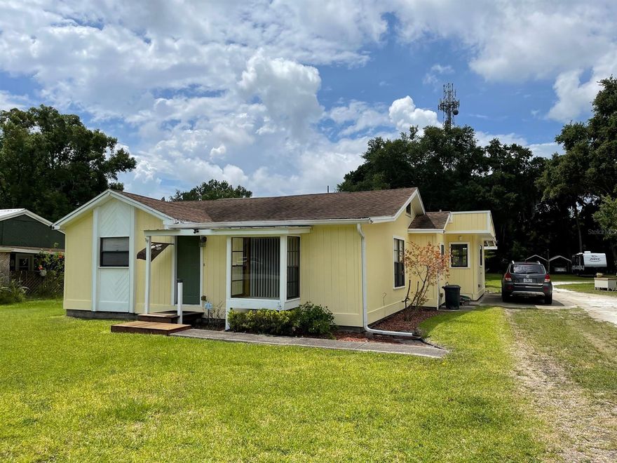 Adorable 3 br/2 bath circa 1949 home features wood flooring, inside utility, French doors leading to wood decking, extra deep 350 foot lot and all centrally located just off Rt 44 in the heart of New Smyrna Beach.  You are just minutes to everything--shopping, dining, the beach, the river.  It doesn't get any better than this if you are looking for the perfect home or beach getaway. ;Water: City