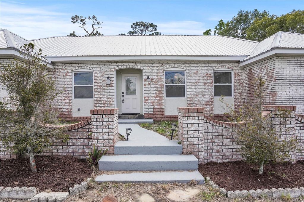 Photo of 1374 Memorial Drive, Avon Park, FL 33825 (MLS # TB8373845)