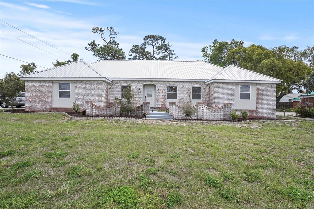 Photo of 1374 Memorial Drive, Avon Park, FL 33825 (MLS # TB8373845)