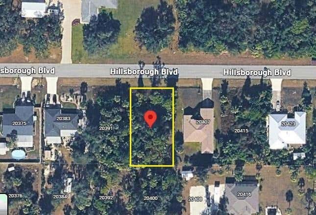 Photo of 20399 Hillsborough Boulevard, Port Charlotte, FL 33954 (MLS # O6433780)