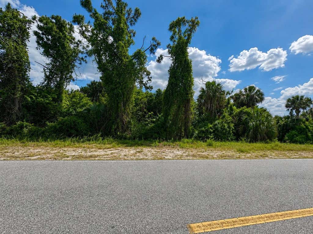Photo of 20399 Hillsborough Boulevard, Port Charlotte, FL 33954 (MLS # O6433780)