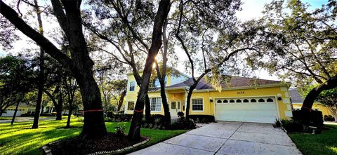 Photo of 2175 Oak Forest Lane, Palm Harbor, FL 34683 (MLS # TB8420662) Photo of 2175 Oak Forest Lane, Palm Harbor, FL 34683 (MLS # TB8420662)