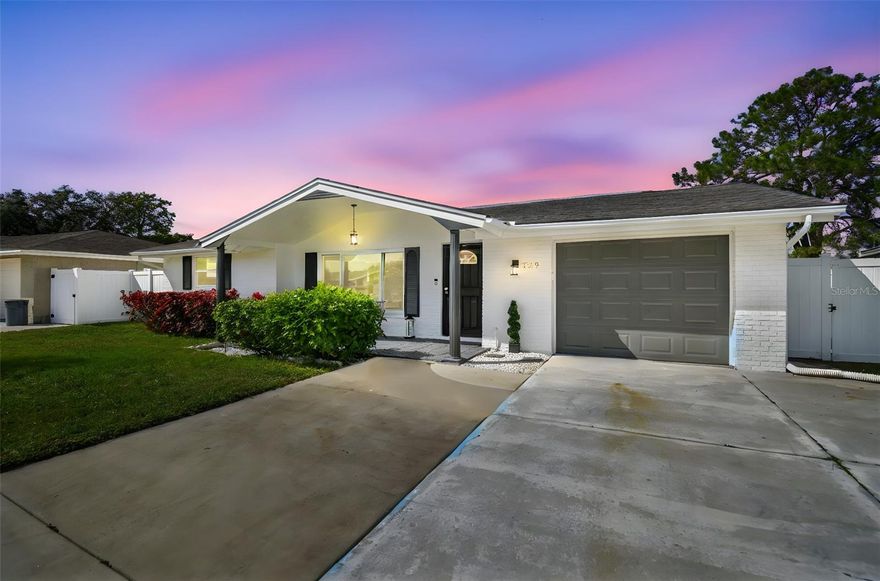 Welcome to 7519 Holly Lake Lane, a beautifully remodeled  3-bedroom, 2-bath retreat where modern comfort meets effortless Florida living.
Completely updated from top to bottom, this charming home impresses from the moment you arrive with gorgeous curb appeal, brand-new windows, and a sleek new sliding glass door that fills the interior with natural light. Step inside to an inviting living space featuring a fabulous modern open concept  kitchen with elegant granite countertops, new cabinets, a closet pantry, and a reverse osmosis system perfect for cooks and entertainers alike. The enclosed porch has been thoughtfully transformed into a cozy TV room, offering additional flexible living space.
Outside, enjoy your private, fully fenced-in yard complete with a covered pergola and an additional seating area with a hot tub ideal for relaxing evenings or hosting friends. Every inch of this home has been curated for comfort, style, and worry-free living for years to come.
A rare find that blends updates, charm, and outdoor enjoyment; this home is truly move-in ready and waiting for its next proud owner. Call and schedule your showing today.