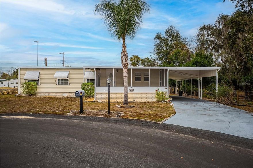 Discover the perfect blend of comfort, convenience, and Florida charm in this inviting 2 bedroom, 2-bath double-wide home located in a friendly 55+ co-op community in beautiful Lakeland, FL. Whether you're searching for a warm winter retreat or an easy-living year-round residence, this home is truly move-in ready.

Step inside to enjoy low-maintenance laminate flooring throughout and a bright, open layout. Relax on the **large screened-in porch**, ideal for morning coffee, evening breezes, or hosting friends. A massive storage building with electricity provides all the space you need for hobbies, tools, or seasonal décor.

Nestled at the end of a quiet cul-de-sac, this home offers rare privacy and peacefulness. Your backyard opens to serene greenspace, where you can often admire visiting wildlife—turkeys, deer, and more. Sun Shade/Storm Awnings are already installed for comfort and added protection.

The community itself is a standout, featuring an **active clubhouse**, social events, and engaging activities—perfect for making new friends and staying active. With easy access to shopping, a very low HOA fee, and true low-maintenance living, this property is designed to help you enjoy the Florida lifestyle to the fullest.

Location, comfort, and community are all here—waiting for you.
Call me today to schedule your personal tour and see why this home is the perfect place to settle in and enjoy life.