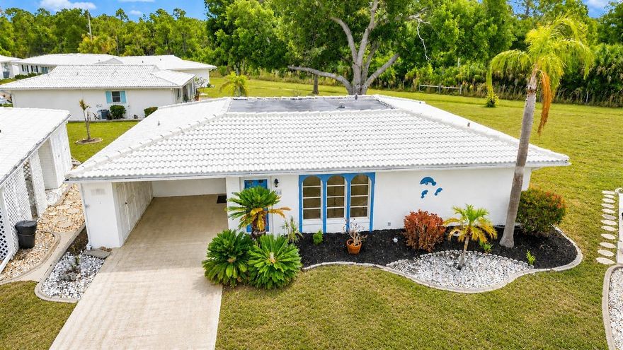 This clean and well-maintained furnished villa backs up to peaceful greenbelt views, offering added privacy in the desirable Circle Woods community, complete with a community pool and spa. New updates include a NEW HVAC system (2024), re-lined sewer pipe (2025), and an updated electrical panel (2020), offering peace of mind for years to come. Inside, tile flooring runs throughout the main living areas, including the living room, dining area, kitchen, and spacious family room. This desirable floor plan offers a seamless flow, perfect for both everyday living and entertaining. The kitchen is enhanced with granite countertops and crown molding accents compliment the main living space, adding a custom touch. Additional built in cabinetry in the laundry room provides extra storage and convenience. The carport is a standout feature, offering a partially enclosed side wall with built-in cabinetry—perfect for added privacy and ample storage. Enjoy easy Florida living in a well-kept community with great amenities and a private, serene backyard setting. Located in an X flood zone so no flood insurance required with most loans and no CDD fees. The monthly fees also includes yard and exterior maintenance in addition to cable TV. Conveniently located just under 4 miles to the gorgeous Manasota Key Beach and a short drive to the Historic Downtown Venice with boutique shops, sidewalk cafes and the Venice Preforming Arts Theater. Or under 7 miles to Wellen Park with the Atlanta Braves Spring Training Facility. This wonderful villa provides an ideal location combined with low maintenance living and amenities for easy Florida living.