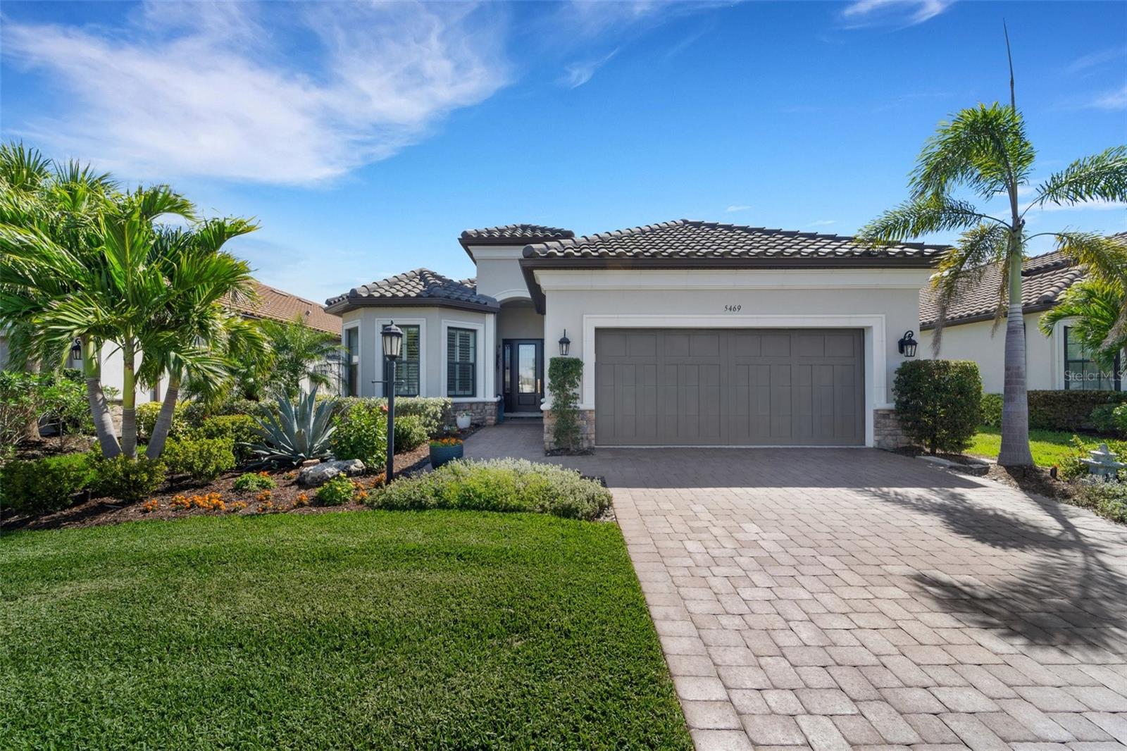 Stunning Upgraded Lazio Model Pool Home in Esplanade on Palmer Ranch
Welcome to this fully upgraded 3-bedroom, 3-bathroom plus den Lazio model, offering 2,441 sq.ft. of beautifully designed living space. Built in 2020, this waterfront pool home is loaded with custom features that blend luxury, comfort, and functionality.
The heart of the home is the chef’s kitchen, complete with an oversized island—perfect for hosting and entertaining. Throughout the home, you'll find elegant upgrades including designer lighting and paint, custom woodwork, window treatments, and professionally designed custom closets.
Additional standout features include:
Whole-home water filtration system
Storm Smart hurricane shades on the lanai
Custom outdoor kitchen with upgraded landscaping
Tandem two-car air-conditioned garage with built-in storage
Enjoy peaceful water views from your lanai, while being just steps from the Legacy Trail pedestrian gate, pickleball courts, and the community’s resort-style amenity center.
Esplanade on Palmer Ranch is a gated, maintenance-free community offering world-class amenities:
On-site Bahama Bar restaurant
Resort-style pool, resistance pool, splash park, and hot tub
Fitness center and private fitness studio with daily classes
8 pickleball courts, 2 tennis courts, and 3 dog parks
Nature trail and direct access to the Legacy Trail
This home is the perfect blend of luxury living and active lifestyle—schedule your private showing today!