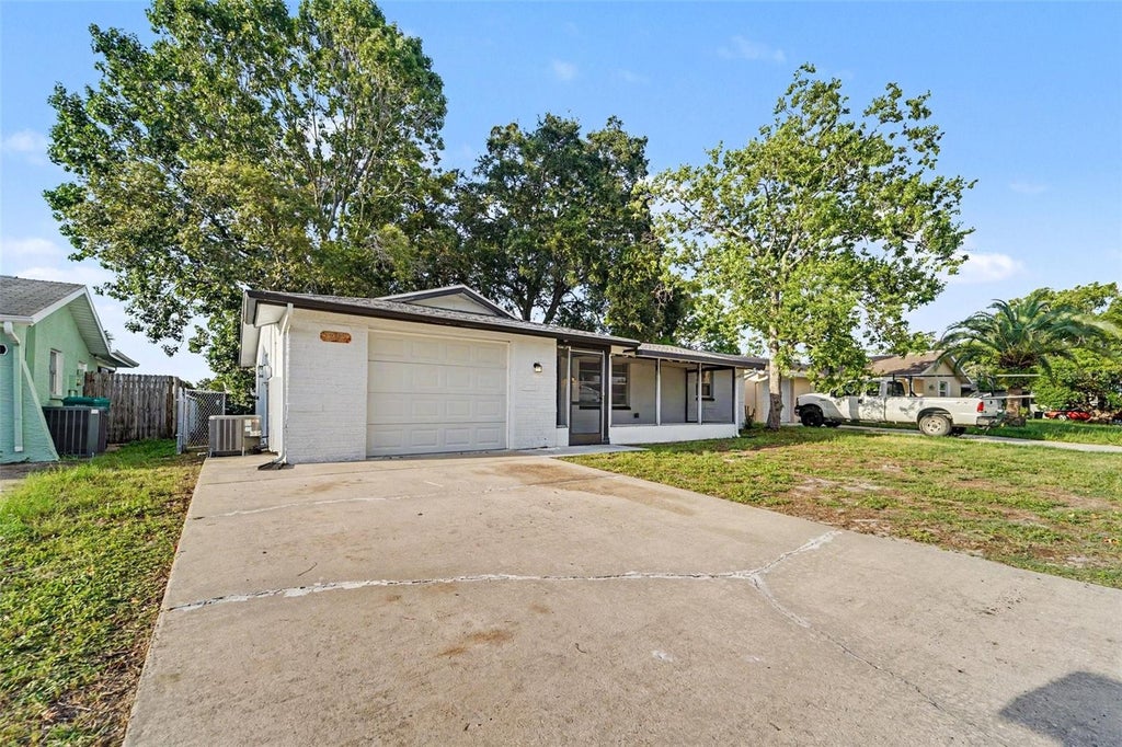Photo of 7207 Sandalwood Drive, Port Richey, FL 34668 (MLS # O6427854)