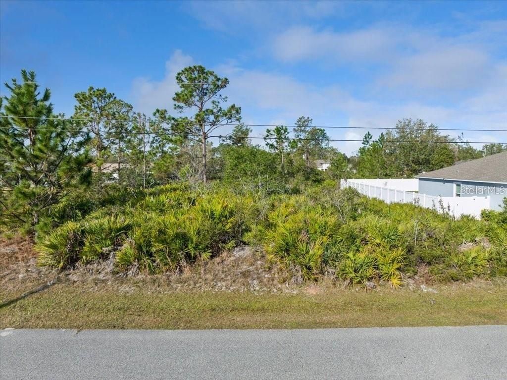 Photo of 10 Rocking Ln, Palm Coast, FL 32164 (MLS # FC317749)