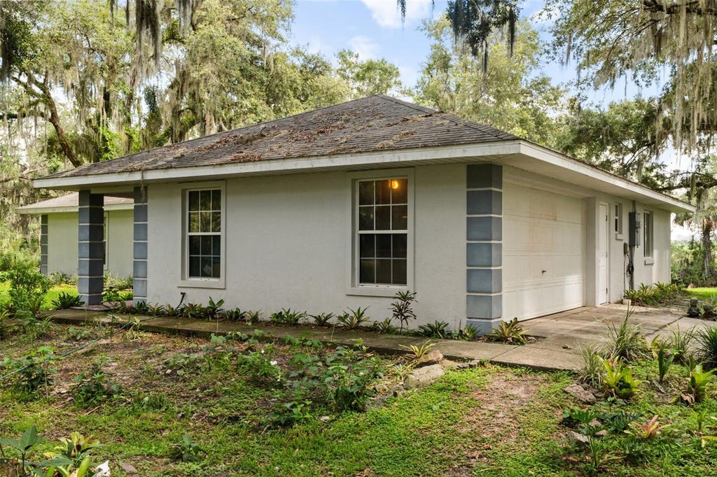 Photo of 7938 Jacksons River Road, Leesburg, FL 34788 (MLS # G5114717)