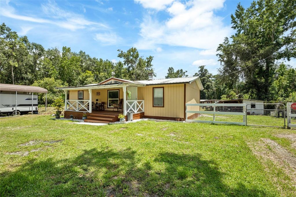 Photo of 17045 NW 128th Terrace, Reddick, FL 32686 (MLS # TB8513668)