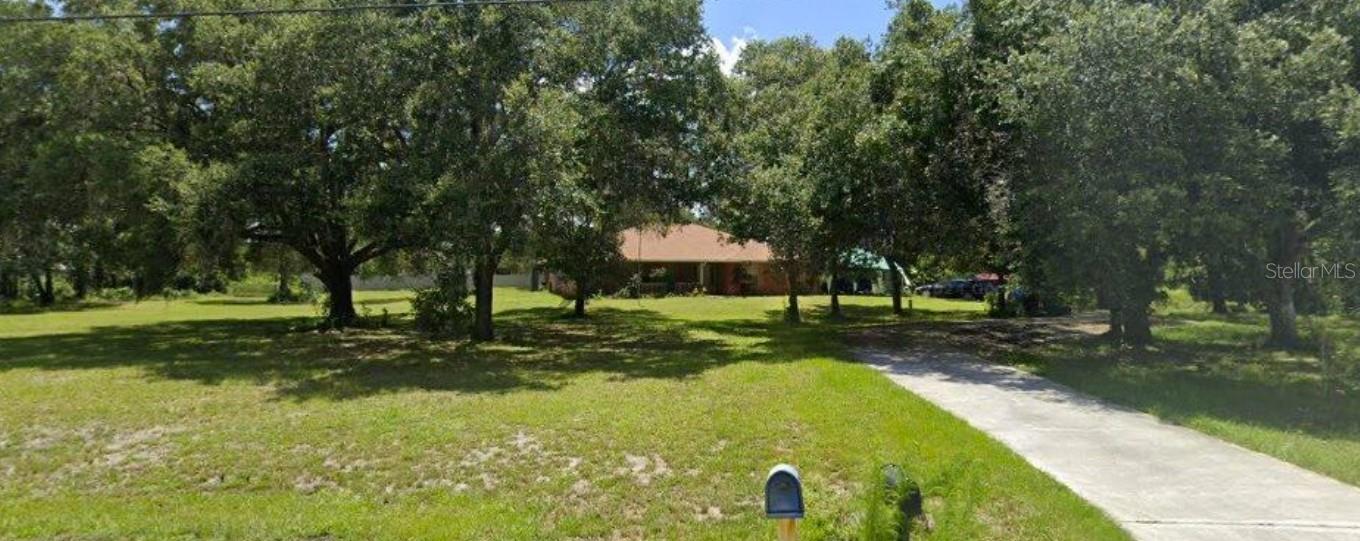 This is a 2 acre parcel and a wonderful house that located in a quiet, peaceful neighborhood. The property sits on two acres of land, which provides plenty of space and the option to subdivide if desired. Please note that the house needs major renovations. The water system need replacement, the roof requires some repairs, some of the electrical wiring should be updated, the plumbing needs attention, and replacing several windows is recommended. This is an excellent opportunity for someone looking to create a custom home or an investment property on a large parcel of land. Want privacy? You got it with this one. Bring your offers!