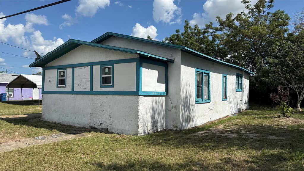 Photo of 1009 Avenue B, Haines City, FL 33844 (MLS # P4939722)