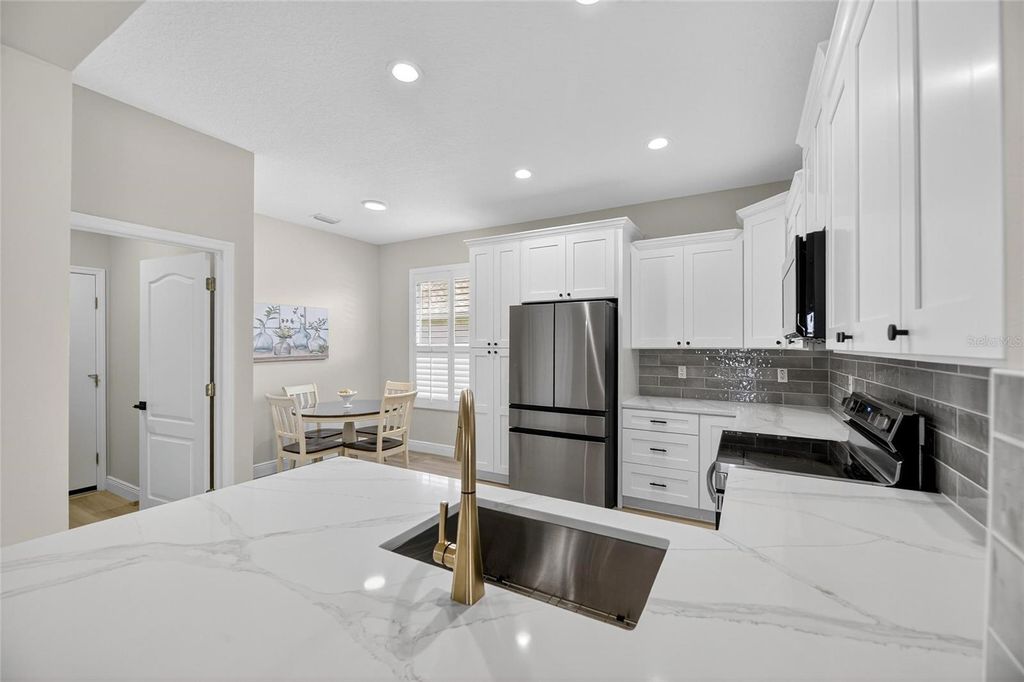 Photo of 1103 Villeroy Drive, Sun City Center, FL 33573 (MLS # TB8409254)