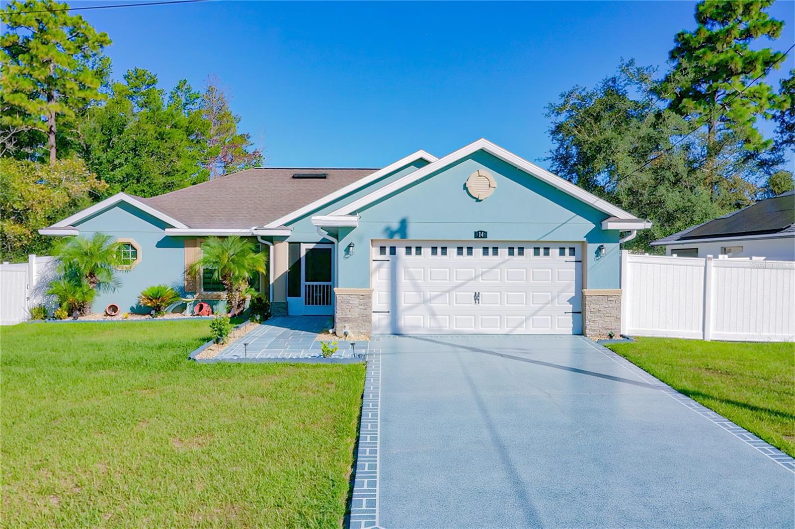 Welcome to this beautifully maintained home nestled in the heart of Silver Springs Shores. This 3-bedroom, 2-bath residence offers comfort, style, and a host of valuable upgrades ready for you to enjoy from day one. Step inside to find all-new zebra blinds throughout, adding a modern touch and enhanced light control to every room. The open living and dining areas flow seamlessly into a well-appointed kitchen, where all appliances stay, making move-in a breeze. Enjoy energy efficiency with a tankless water heater and peace of mind with a $6,000 upgraded water softener and treatment system already installed. Whether you're hosting or relaxing, the back porch offers a great outdoor space with an outdoor kitchen (please note: ice maker and table on the porch do not convey). Additional perks include two shed homes, perfect for extra storage, hobbies, or workshop needs, both included with the sale! There is a Walmart, Publix and Aldi close by as well as a new Tractor Supply opening soon! Don’t miss this opportunity to own a move-in ready home in a quiet, established neighborhood. Schedule your showing today!