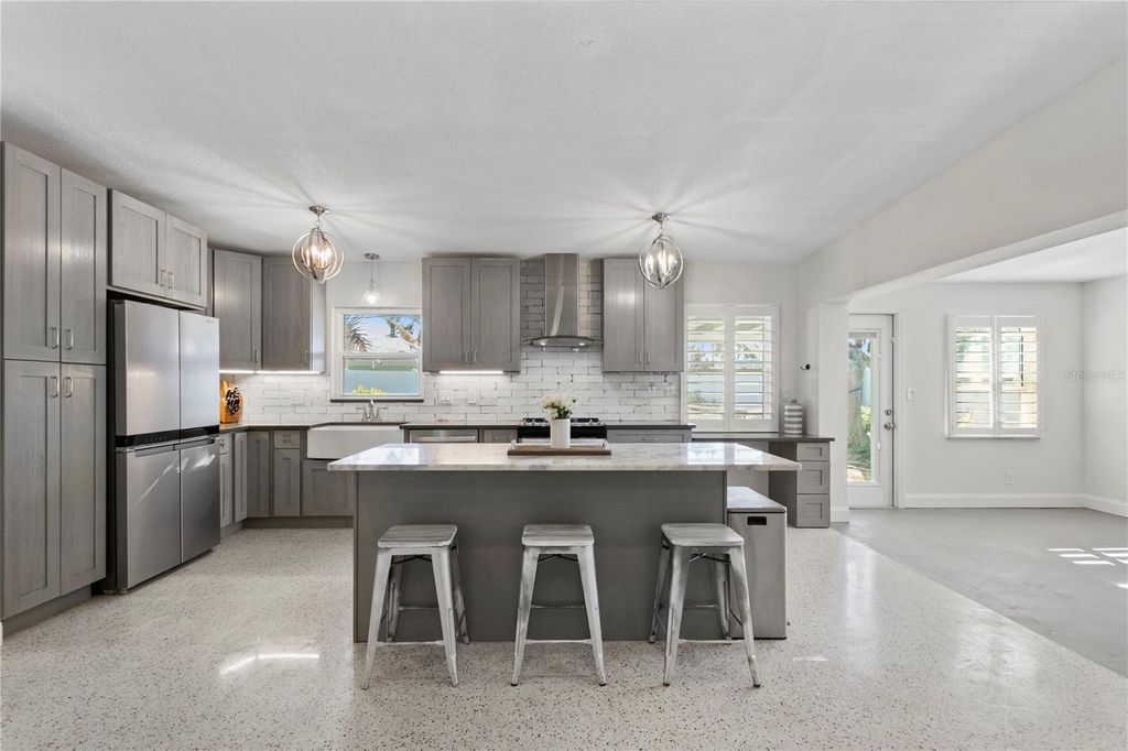 Photo of 6931 Grande Vista Way S, St Petersburg, FL 33707 (MLS # TB8493614)