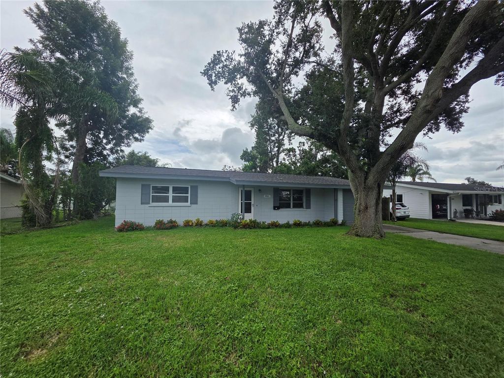 Photo of 4461 Maceachen Boulevard, Sarasota, FL 34233 (MLS # A4664612)