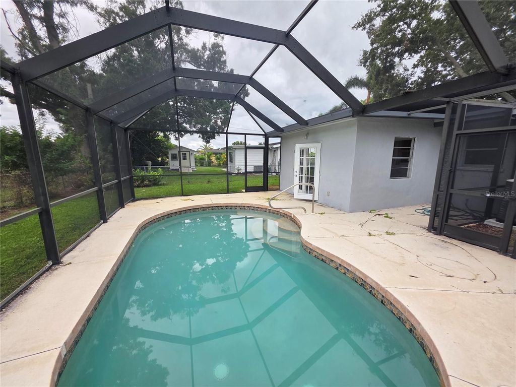 Photo of 4461 Maceachen Boulevard, Sarasota, FL 34233 (MLS # A4664612)