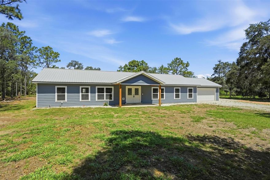 4.4 BEAUTIFUL ACRES in a PARK-LIKE SETTING!  FANTASTIC MOVE IN READY SITE-BUILT 2024 HOME! Super Location Only Minutes Away from Suncoast Parkway, Shopping, etc, HUGE Light & Bright KITCHEN with OVERSIZED ISLAND and TONS OF CABINETS / LOADS OF STORAGE, Fantastic GRANITE COUNTERS, Remaining Stainless Appliances, Vinyl Plank Flooring Throughout, Vaulted Ceilings, Split Bedroom Plan, LARGE Living Room Area, Office could be 4th bedroom(no closet), Big Primary Bedroom, Double Vanity Primary Bath with Tile Shower, Neutral Tones, Front and Rear Covered Porch Areas, VERY CLEAN / Neat & Ready for a New Owner! Home is Not in a Flood Zone (X).