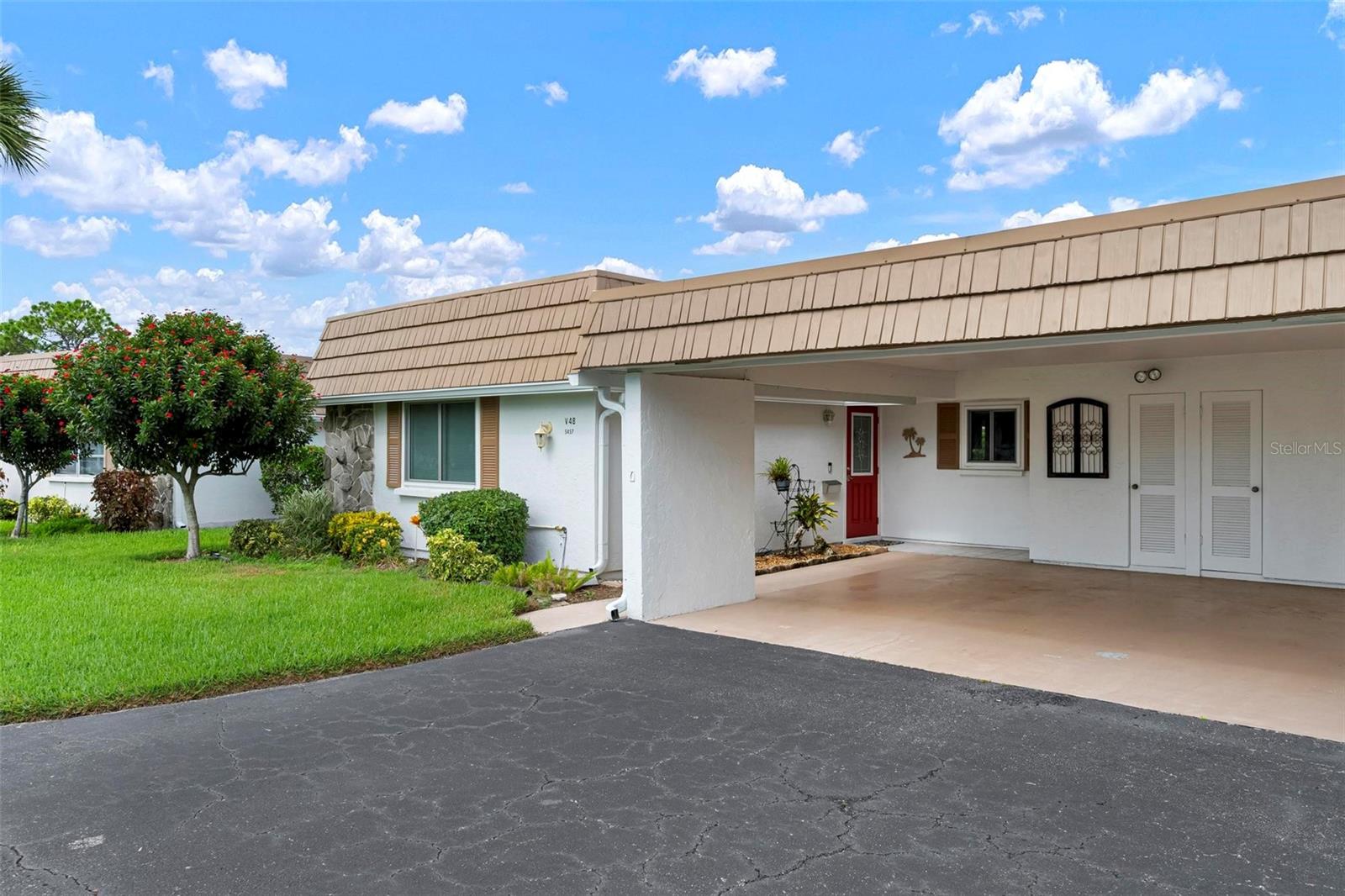 Experience the best of Sarasota living in one of its premier 55+ communities. This charming 2-bedroom, 2-bath villa-style condo is nestled on a quiet street and is truly move-in ready. Insulated hurricane impact windows (installed in 2012) fill the home with natural light. The open-concept living and dining area offers ample space for entertaining, seamlessly connecting to the family room and adjoining Florida room. Sliding glass doors provide tranquil views of the private rear garden. The spacious primary suite includes an ensuite bath and walk-in closet, while the second bedroom and adjacent bath offer guests privacy and comfort. Top-of-the-line vinyl plank flooring and ceramic tile throughout and the primary suite ensure easy maintenance. Recent updates include a resealed roof and a new electric panel (2018). The utility room is equipped with a washer, dryer, and generous storage. Strathmore Riverside fosters a friendly, active lifestyle and is conveniently located near Sarasota’s renowned cultural venues, beaches, shopping, and dining. Don’t miss this exceptional opportunity!