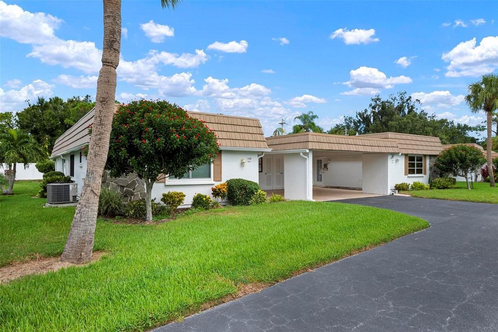 Photo of 5457 Riverbluff Circle #V48, Sarasota, FL 34231 (MLS # A4661814)