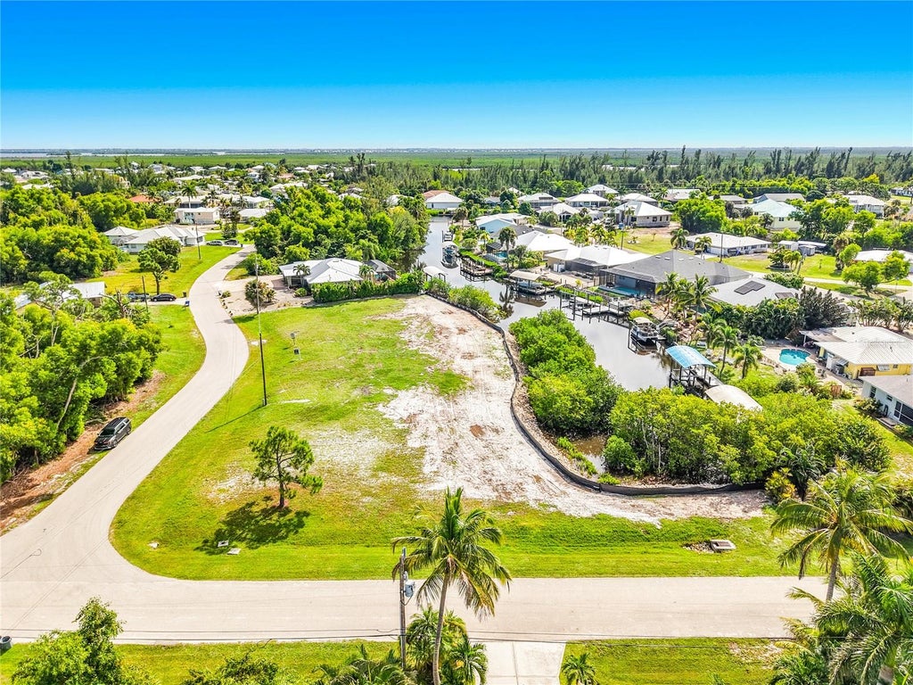 Photo of 5675 Ann Arbor Drive, Bokeelia, FL 33922 (MLS # C7531066)