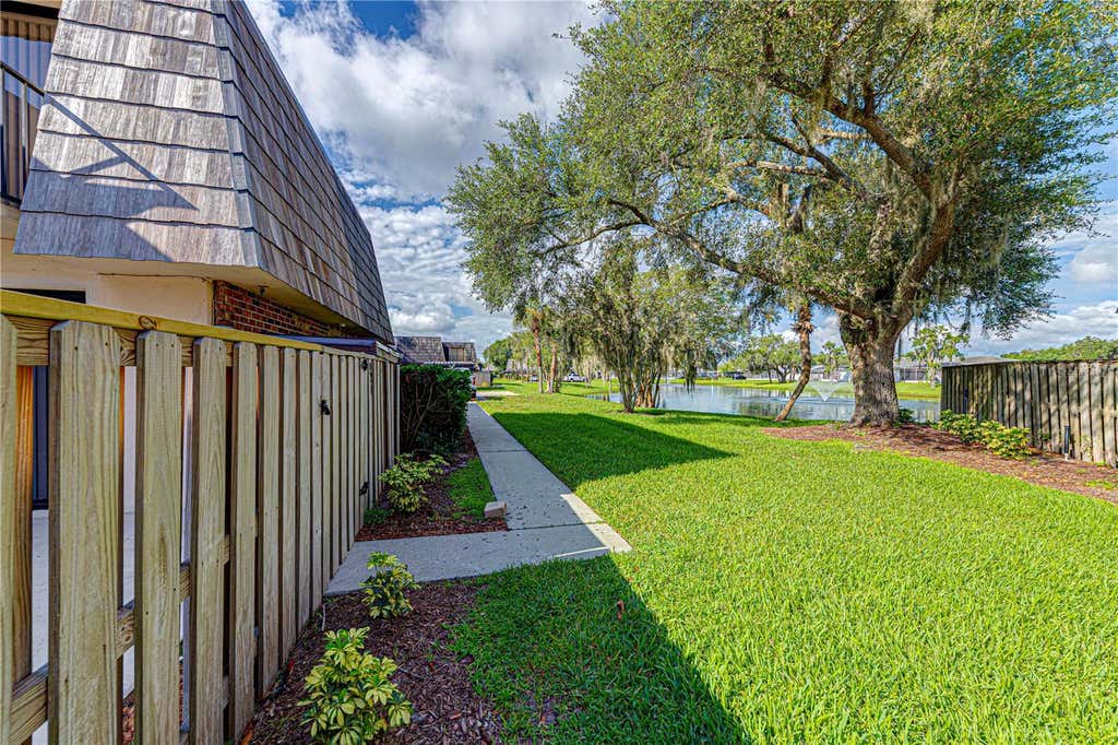 Photo of 921 Royal Oak Boulevard, Leesburg, FL 34748 (MLS # O6422191)
