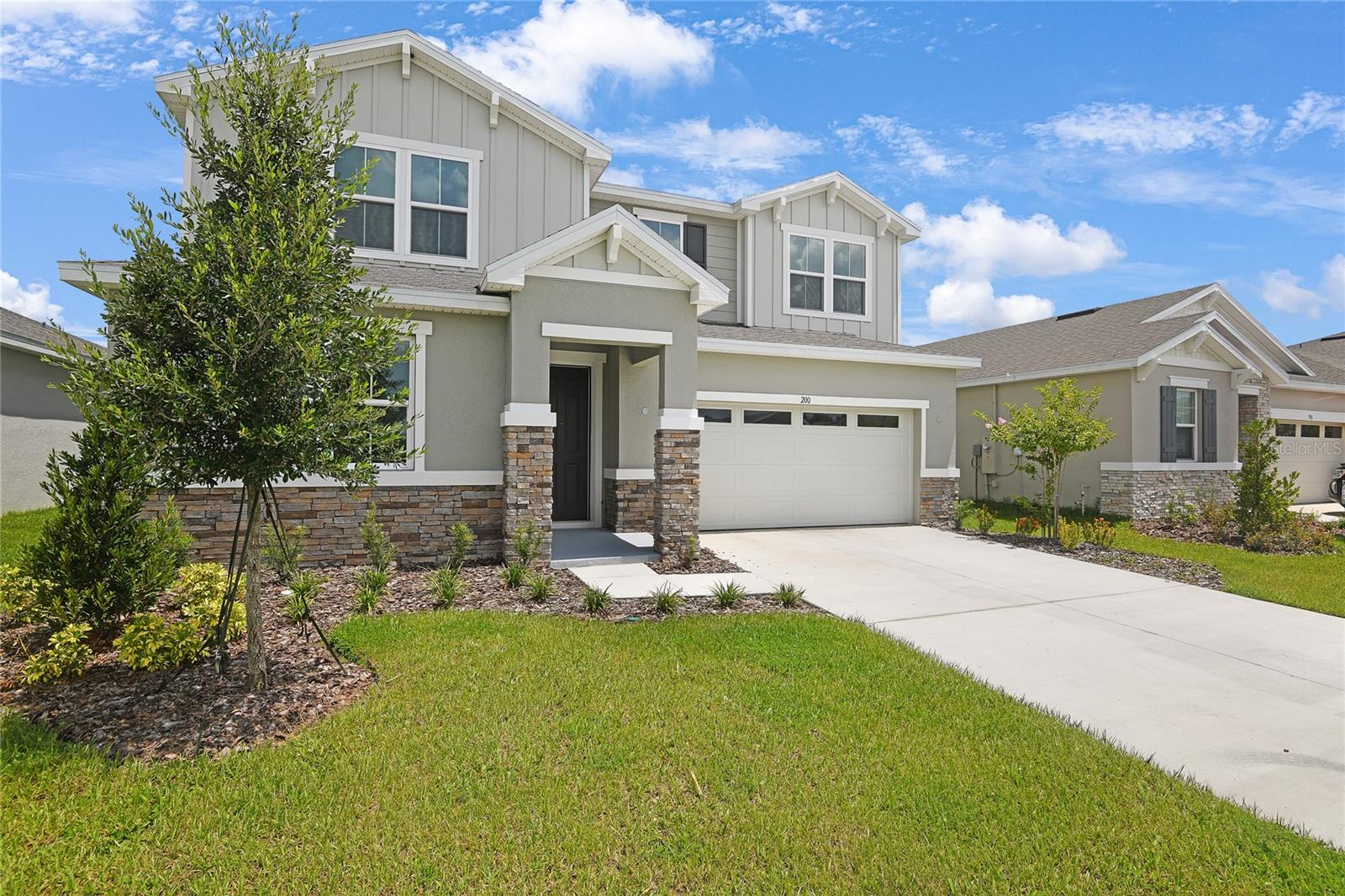 Explore this beautiful Ammolite home, ready for quick move-in. Included features: a charming covered entry; a thoughtfully designed kitchen offering 42" white cabinets, quartz countertops, stainless-steel appliances, a center island and a roomy pantry; a roomy nook; an impressive guest suite; a stunning primary suite showcasing an immense walk-in closet and a private bath with double sinks; a convenient laundry with a washer and dryer; a covered patio and a great room. This home also offers ceramic tile flooring in select rooms. Tour today! 1x capital contribution fee of $850.