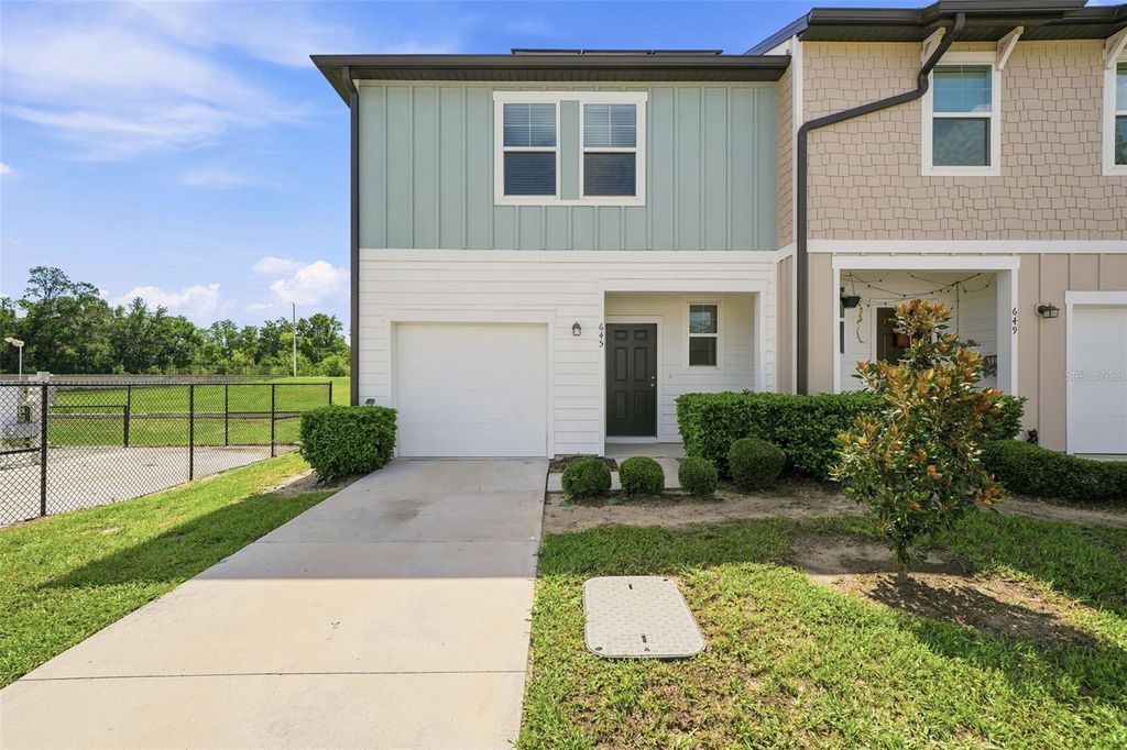 Photo of 645 Madison Drive, Davenport, FL 33837 (MLS # O6422817)