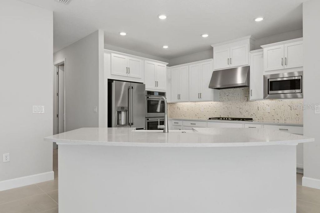 Photo of 664 Junonia Boulevard, New Smyrna Beach, FL 32168 (MLS # O6365891)