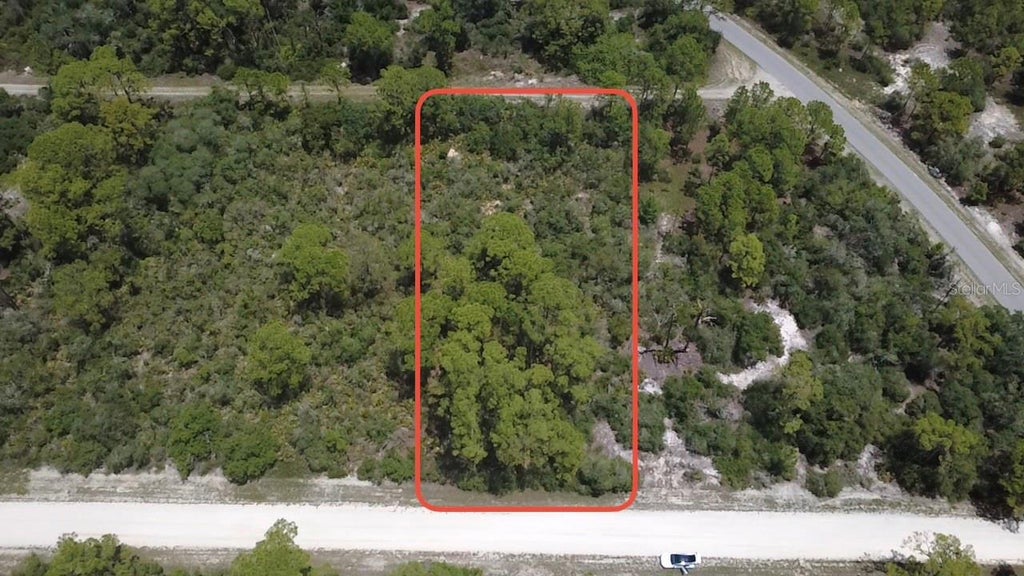 Photo of 346 Blue Moon Ave, Lake Placid, FL 33852 (MLS # O6420019)