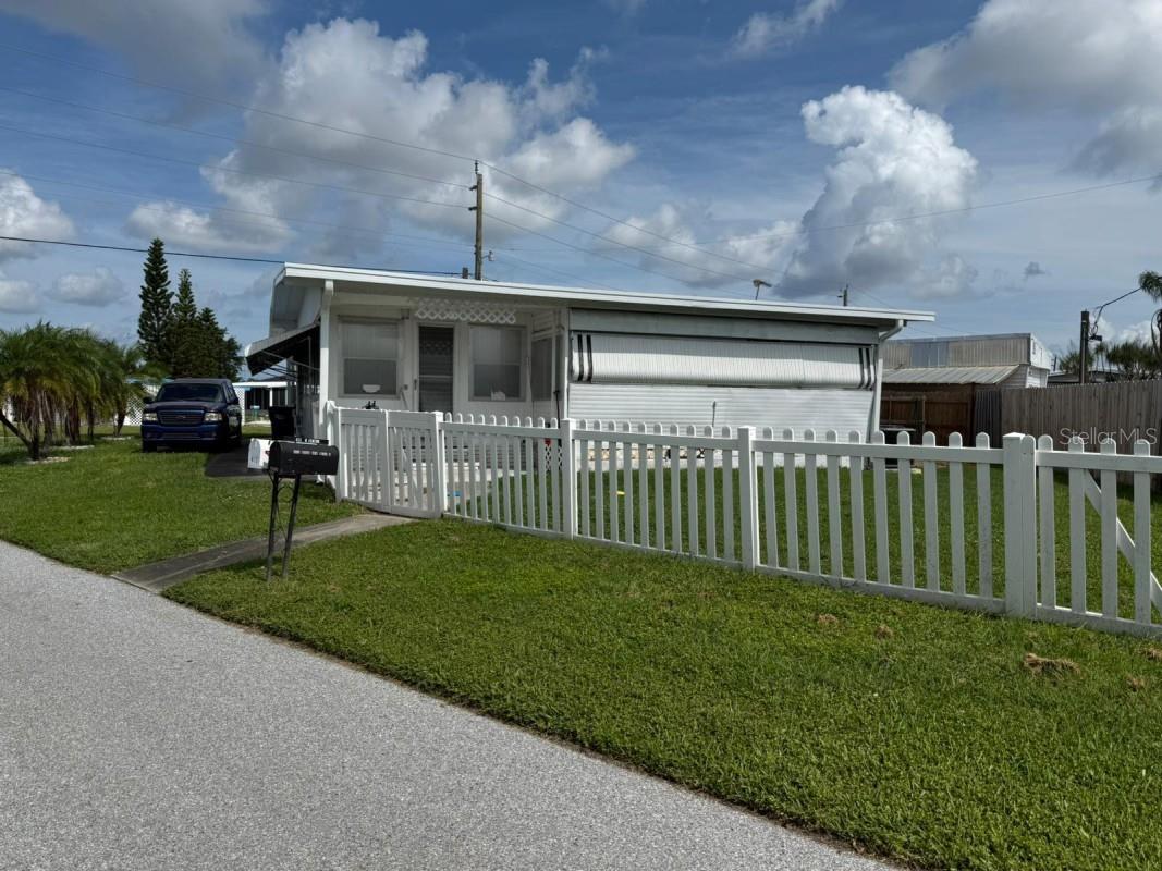 Beautiful Mobile-home in Bradenton. This expanded 1958 mobile home (actual 2/1.5, ~1,100 sqft) sits on the largest fenced lot in the community and packs serious value with a brand new aluminum roof, new AC, and whole-house generator hookup. Own the land with low month HOA in this quiet owner's park. Perfect for investors who want recent major updates without the work