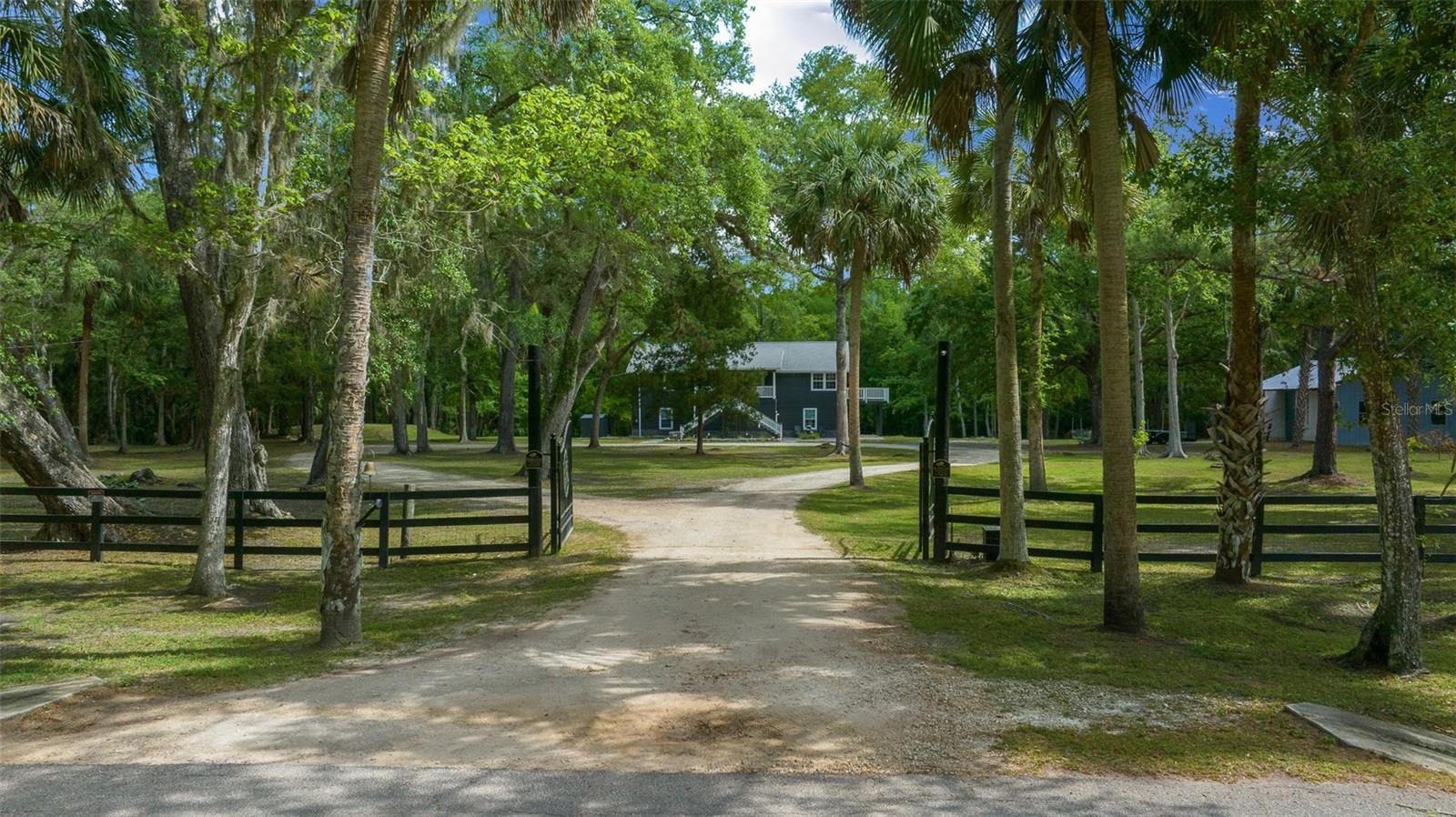 Charming Country Retreat on 5 Acres – Upgraded Home with Modern Comforts & Nature All Around!
Welcome to your peaceful paradise! Nestled on 5 serene, fully fenced and gated acres, this beautifully remodeled home offers the perfect blend of quiet country living and convenience—just minutes from town, local amenities, Silver Springs State Park, and only an hour to Ormond Beach.
This turnkey 3-bedroom, 2.5-bath home was completely upgraded including a new roof (2019), new AC (2019), and high-speed fiber optic internet availability—perfect for remote work or streaming in style.
The heart of the home is the brand-new kitchen, a dream for any cook or baker, with all new appliances, two dishwashers, and a rare butler's/back kitchen setup for seamless entertaining or prepping.
Both bathrooms are fully renovated, and the entire home boasts new flooring, lighting, and fresh paint. The spacious multipurpose room with a custom bar flows effortlessly to the large screened lanai featuring a hot tub—a true entertainer’s delight!
Outdoors, enjoy the Florida sunshine, fruit trees, and the quietness of your private acreage. A large workshop/barn with new roof provides ample room for hobbies, storage, or business needs.
Whether you're seeking a tranquil lifestyle or a home designed for gatherings and guests, this property has it all—privacy, nature, convenience, and style.
Don’t miss this rare find—schedule your private showing today!