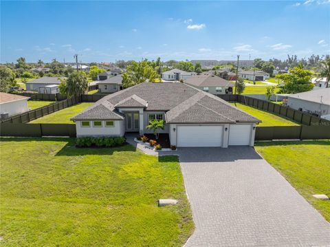 Photo of 209 SW 10th Place, Cape Coral, FL 33991 (MLS # C7512932)