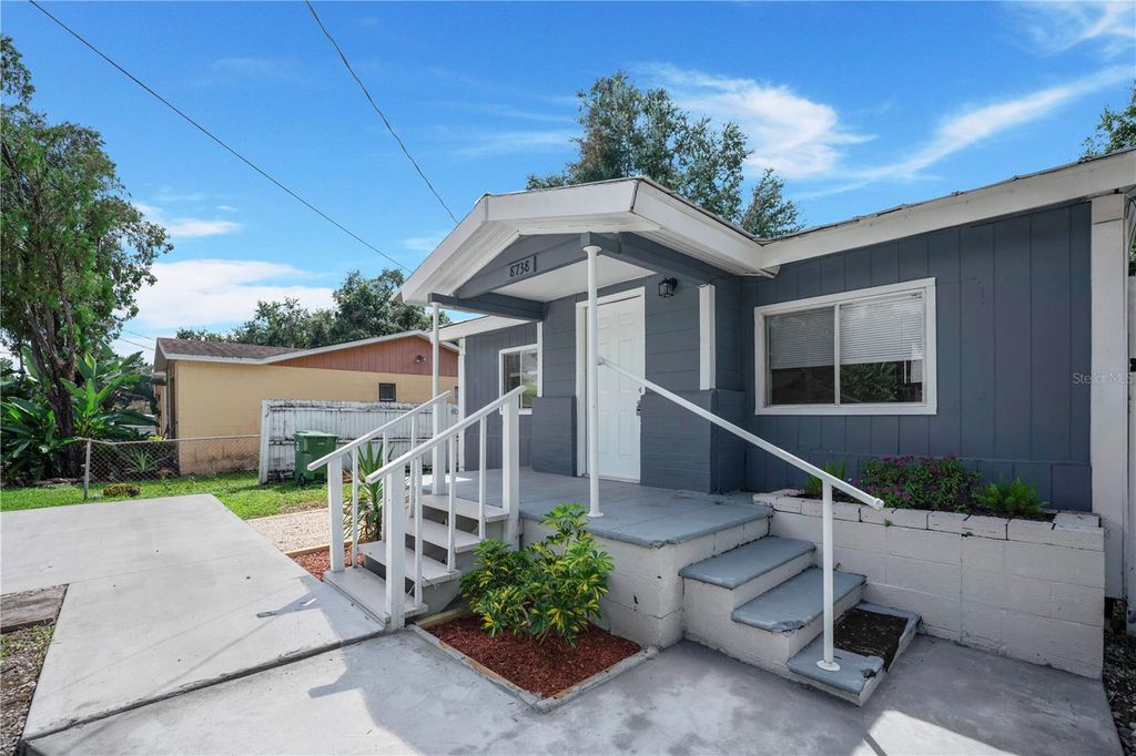 Photo of 8738 N Tangerine Place, Tampa, FL 33617 (MLS # TB8431972)