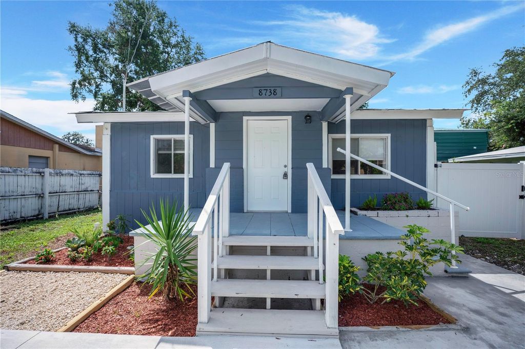 Photo of 8738 N Tangerine Place, Tampa, FL 33617 (MLS # TB8431972)