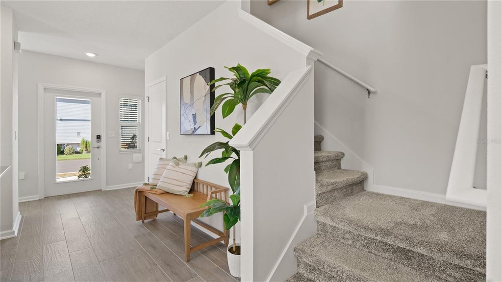 Photo of 5646 Kettlebell Alley, Clermont, FL 34714 (MLS # O6440675)