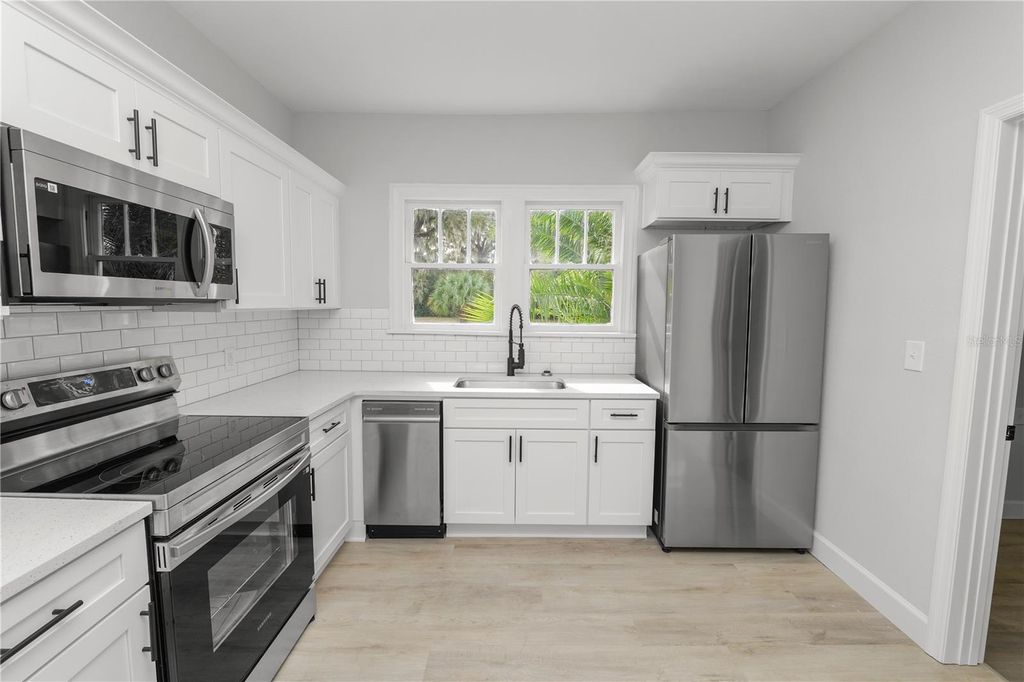 Photo of 26 S Lanier Avenue, Fort Meade, FL 33841 (MLS # L4958651)