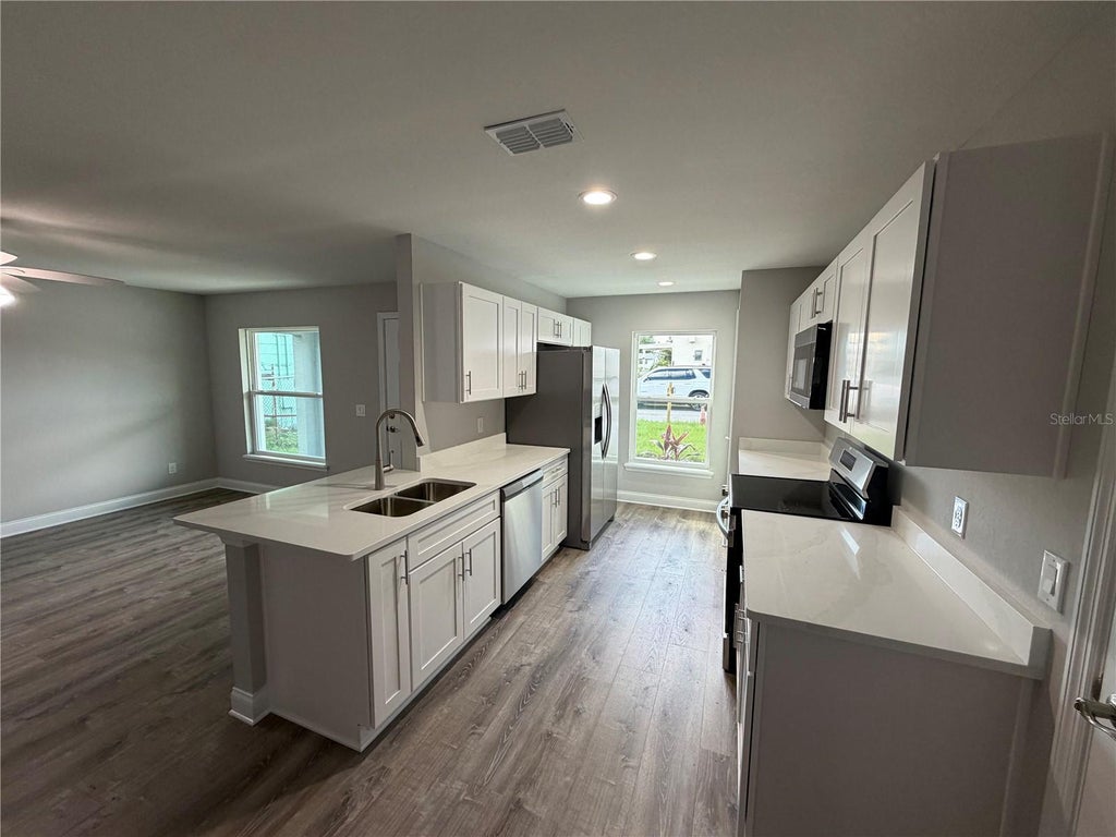 Photo of 306 SW 1st Ave, Mulberry, FL 33860 (MLS # P4940222)